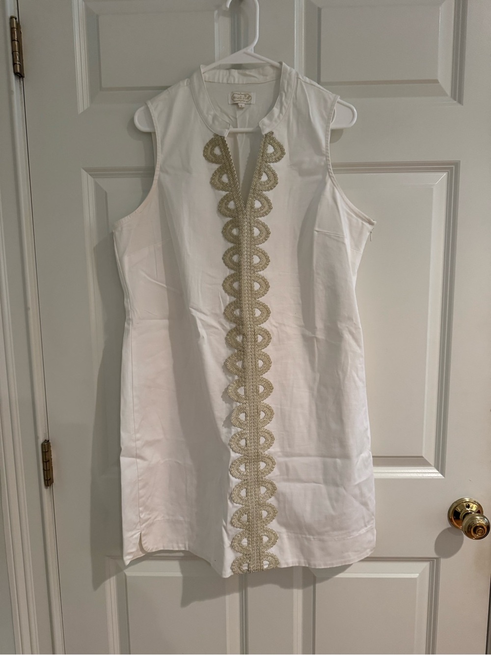 Sleeveless White Shift Dress with Gold Trim